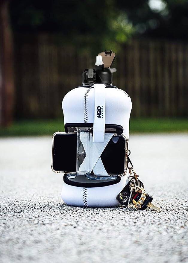 H2O Capsule 2.2L Half Gallon Water Bottle with Storage Sleeve and Covered Straw Lid – BPA Free Large Reusable Drink Container with Handle - Big Sports Jug, 2.2 Liter (74 Ounce)