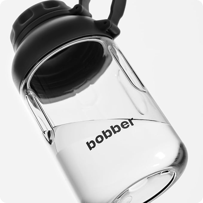 BOBBER 20 oz Tritan Water Bottle with Carry Strap & Strainer Lid — BPA Free Water Bottle for Gym — Dishwasher Safe Sturdy Water Bottle — Easy Carry Leak Proof Gym Workout Bottle for Men, Women (Black)