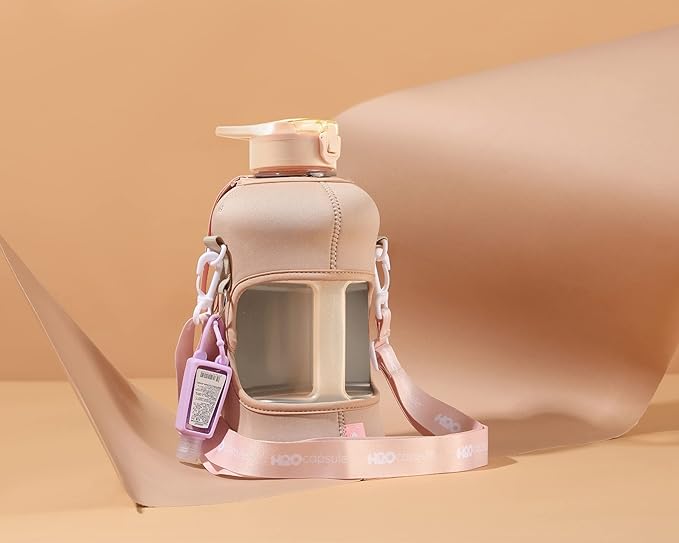 H2O Capsule 2.2L Half Gallon Water Bottle with Storage Sleeve and Removable Straw – BPA Free Large Reusable Drink Container with Handle - Big Sports Jug, 2.2 Liter (74 Ounce), Sandy Beige