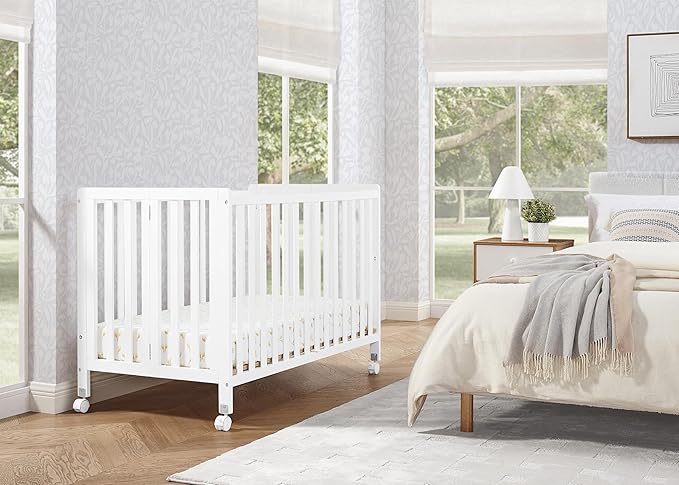 Delta Children Simmons Kids Aria Full Size Portable Folding Crib - Greenguard Gold Certified, Bianca White