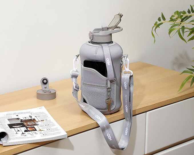 H2O Capsule 2.2L Half Gallon Water Bottle with Storage Sleeve and Removable Straw – BPA Free Large Reusable Drink Container with Handle - Big Sports Jug, 2.2 Liter (74 Ounce), Ashville