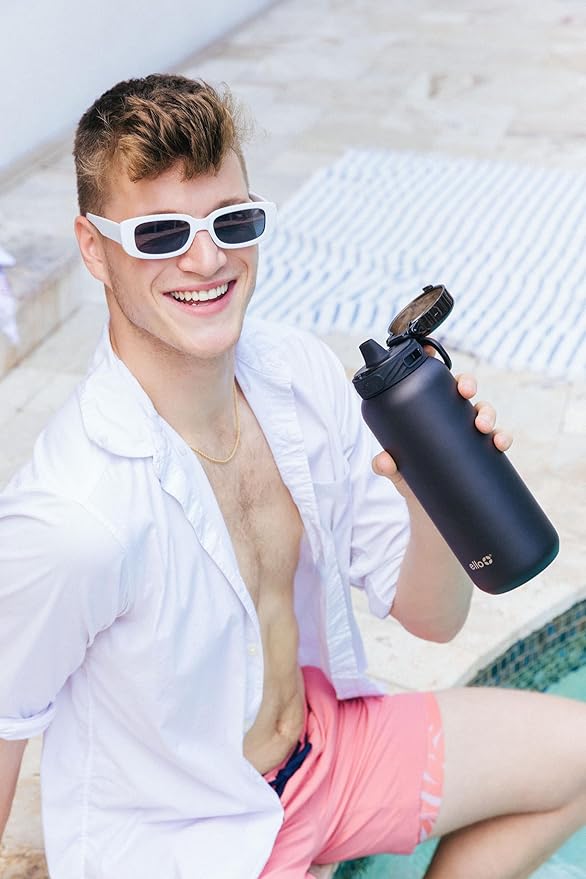 Ello Cooper 18oz Kids Stainless Steel Water Bottle with Straw and Carry Handle, Double Walled and Vacuum Insulated Metal, Leak Proof Locking Lid with Soft Silicone Spout, Reusable, BPA Free, Black