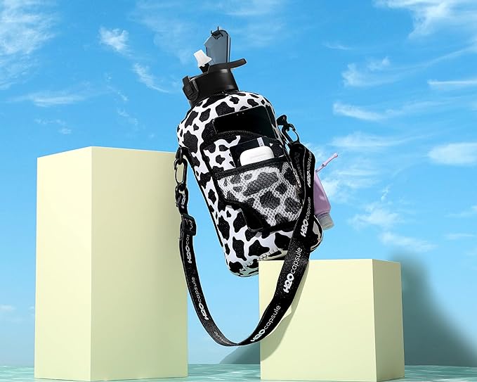 H2O Capsule 2.2L Half Gallon Water Bottle with Storage Sleeve and Removable Straw – BPA Free Large Reusable Drink Container with Handle - Big Sports Jug, 2.2 Liter (74 Ounce), Cowbell