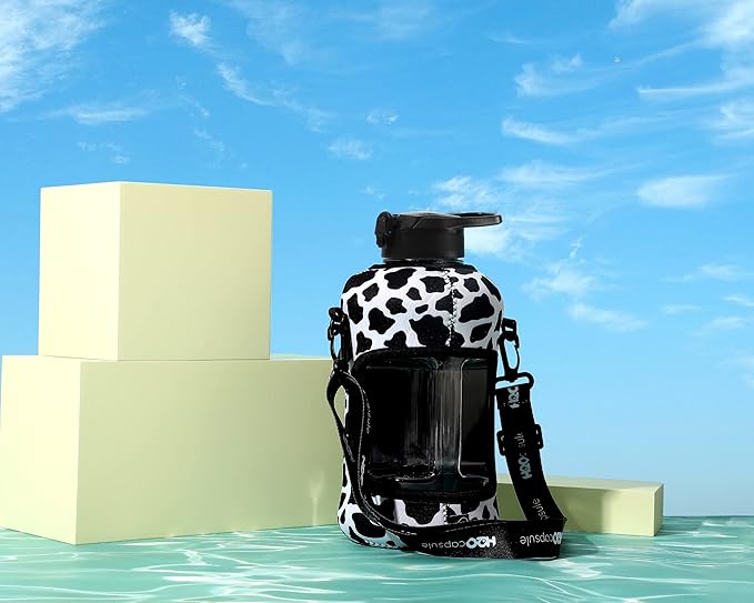 H2O Capsule 2.2L Half Gallon Water Bottle with Storage Sleeve and Removable Straw – BPA Free Large Reusable Drink Container with Handle - Big Sports Jug, 2.2 Liter (74 Ounce), Cowbell